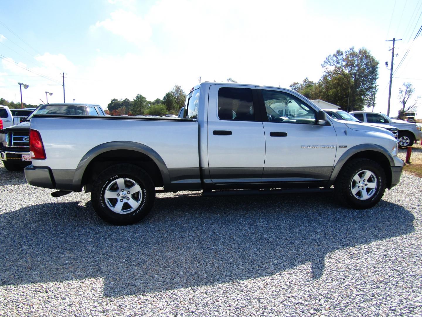 2011 Silver Dodge Ram 1500 Sport Quad Cab 4WD (1D7RV1GT9BS) with an 5.7L V8 OHV 16V engine, Automatic transmission, located at 15016 S Hwy 231, Midland City, AL, 36350, (334) 983-3001, 31.306210, -85.495277 - Photo#4